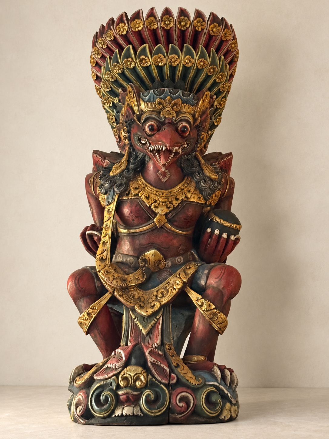 A Large and Elaborate Carved Polychrome Garuda Figure