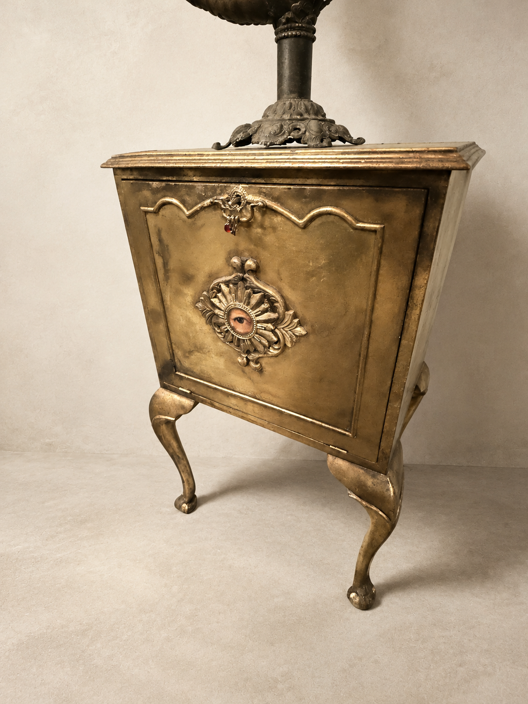 Painted and Gilt Bedside Cabinet with Eye Cartouche