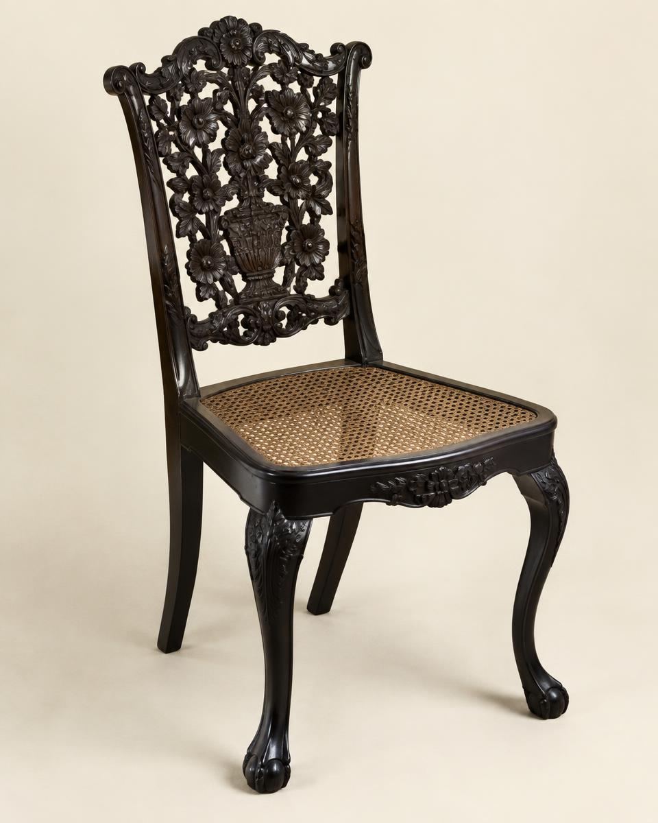 An Anglo-Indian Carved Ebony Chair
